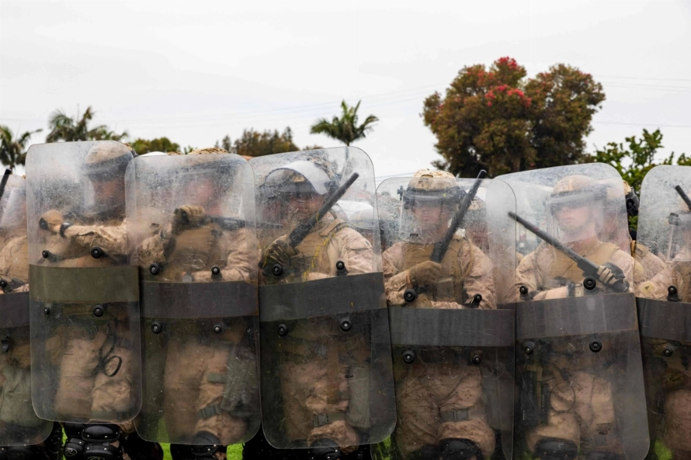 U.S. Marines who were placed in an alert status over the weekend rehearse nonlethal tactics in the greater Los Angeles area. U.S. Marines who were placed in an alert status over the weekend rehearse nonlethal tactics in the greater Los Angeles area.