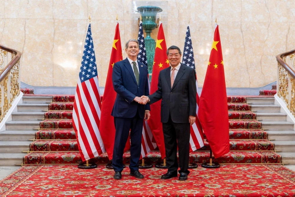 U.S. Secretary of Treasury Scott Bessent and Chinese Vice Premier He Lifeng shake hands at Lancaster House in London on Monday. U.S. Secretary of Treasury Scott Bessent and Chinese Vice Premier He Lifeng shake hands at Lancaster House in London on Monday.