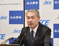 Satoshi Fujii, head of a subcommittee at the Japan Society of Civil Engineers, speaks at a news conference in Tokyo on Wednesday. | Jiji