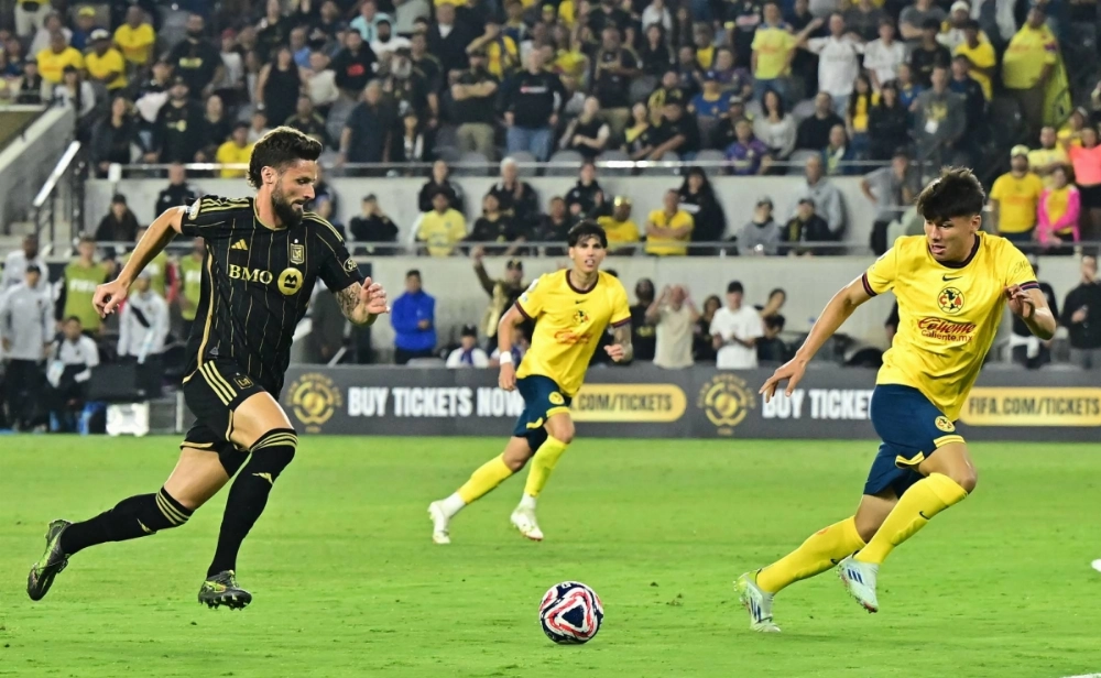 LAFC forward Olivier Giroud vies for the ball against Club America's Miguel Vazquez during a match on May 31 in Los Angeles.  LAFC forward Olivier Giroud vies for the ball against Club America's Miguel Vazquez during a match on May 31 in Los Angeles.