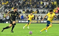 LAFC forward Olivier Giroud vies for the ball against Club America's Miguel Vazquez during a match on May 31 in Los Angeles.  | AFP-JIJI