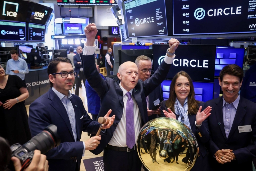 Jeremy Allaire, chief executive officer of Circle Internet Financial (center) celebrates during the company's initial public offering on the floor of the New York Stock Exchange on June 5. Jeremy Allaire, chief executive officer of Circle Internet Financial (center) celebrates during the company's initial public offering on the floor of the New York Stock Exchange on June 5.