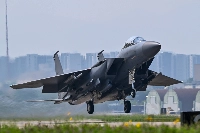 South Korea's F-15K fighters were involved in a joint aerial exercise with Japanese and U.S. fighters off South Korea's Jeju island Wednesday. | South Korean Air Force / via Jiji