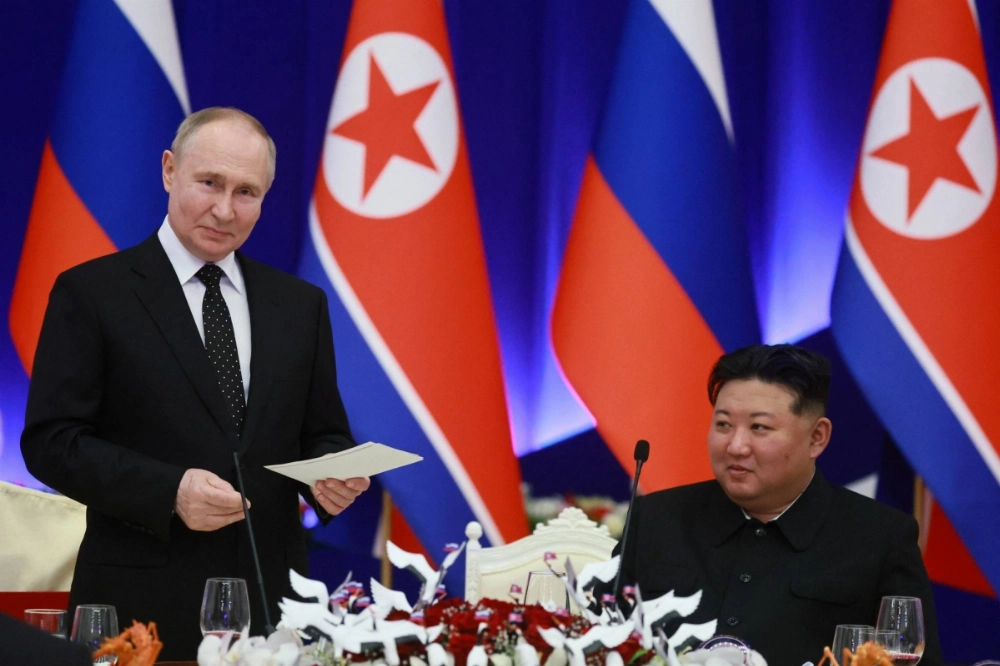 Russia's President Vladimir Putin and North Korea's leader Kim Jong Un attend a state reception in Pyongyang on June 19, 2024. Russia's President Vladimir Putin and North Korea's leader Kim Jong Un attend a state reception in Pyongyang on June 19, 2024.