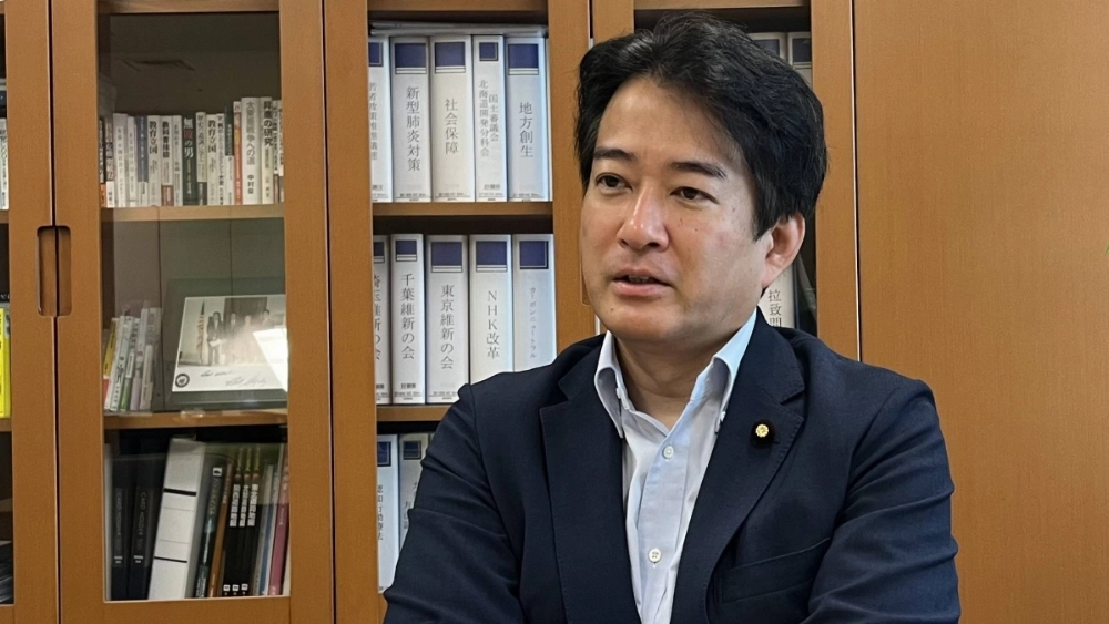 Upper House lawmaker Hirofumi Yanagase in his office on June 9. Last month in parliament, he urged the criteria for naturalization to be revised. Upper House lawmaker Hirofumi Yanagase in his office on June 9. Last month in parliament, he urged the criteria for naturalization to be revised.