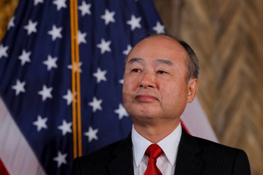 SoftBank CEO Masayoshi Son at Donald Trump's resort in Florida in December last year SoftBank CEO Masayoshi Son at Donald Trump's resort in Florida in December last year