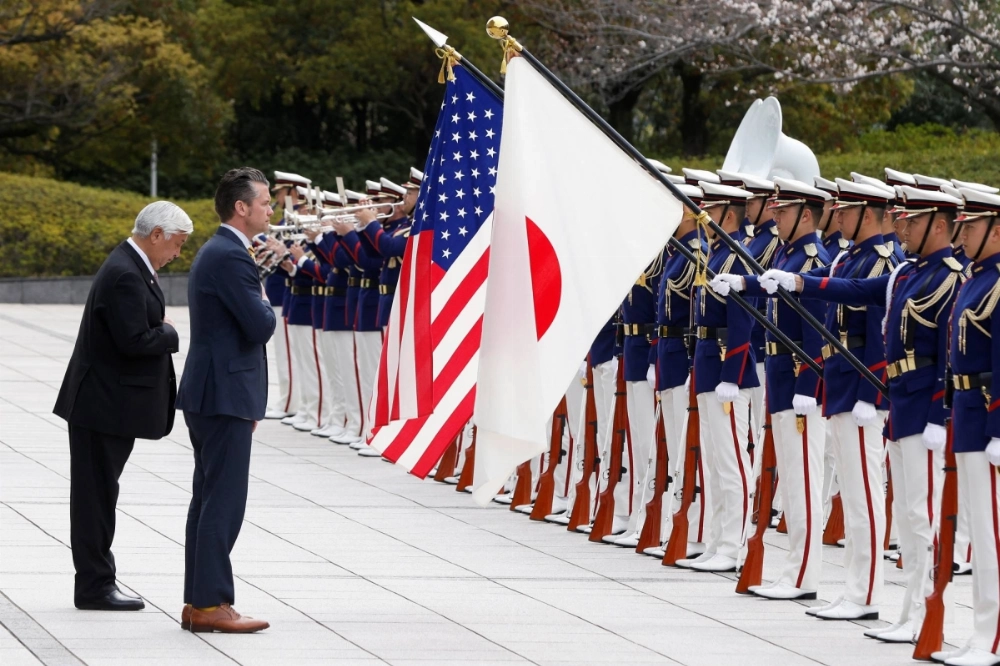 Defense Minister Gen Nakatani U.S. Defense Secretary Pete Hegseth review an honor guard during a welcome ceremony at the Ministry of Defense in Tokyo on March 30. Defense Minister Gen Nakatani U.S. Defense Secretary Pete Hegseth review an honor guard during a welcome ceremony at the Ministry of Defense in Tokyo on March 30.
