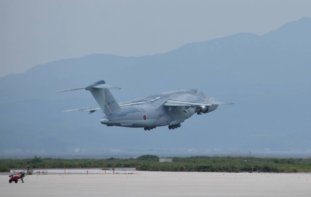 An Air Self-Defense Force C2 transport aircraft takes off for Djibouti on Saturday. An Air Self-Defense Force C2 transport aircraft takes off for Djibouti on Saturday.