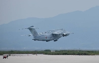An Air Self-Defense Force C2 transport aircraft takes off for Djibouti on Saturday. | jiji