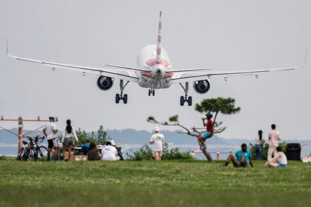 An American Airlines plane lands at Reagan National Airport in Virginia on Sunday. The airline suspended flights to Qatar in the days before the U.S. strikes on Iran. An American Airlines plane lands at Reagan National Airport in Virginia on Sunday. The airline suspended flights to Qatar in the days before the U.S. strikes on Iran.
