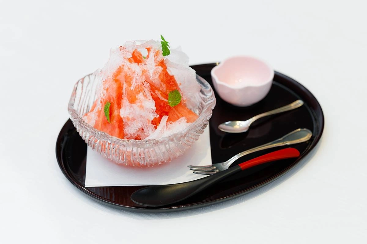 A luxury shaved ice dessert with  premium watermelon from Tottori. A luxury shaved ice dessert with  premium watermelon from Tottori.