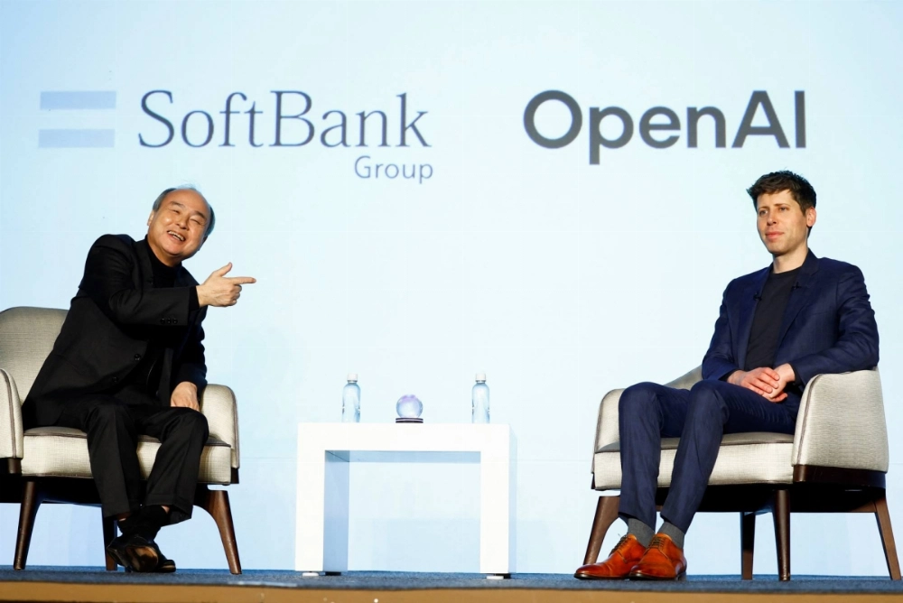 SoftBank CEO Masayoshi Son and his OpenAI counterpart, Sam Altman, attend an event to pitch AI for businesses in Tokyo in early February. The SoftBank founder is now proposing his most ambitious venture yet — a $1 trillion AI and robotics hub in Arizona.  SoftBank CEO Masayoshi Son and his OpenAI counterpart, Sam Altman, attend an event to pitch AI for businesses in Tokyo in early February. The SoftBank founder is now proposing his most ambitious venture yet — a $1 trillion AI and robotics hub in Arizona.