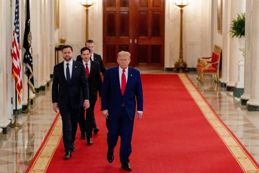 U.S. President Donald Trump arrives for an address to the nation, as Vice President JD Vance (from left) Secretary of State Marco Rubio and Defense Secretary Pete Hegseth trail him in the East Room of the White House in Washington on Saturday. U.S. President Donald Trump arrives for an address to the nation, as Vice President JD Vance (from left) Secretary of State Marco Rubio and Defense Secretary Pete Hegseth trail him in the East Room of the White House in Washington on Saturday.