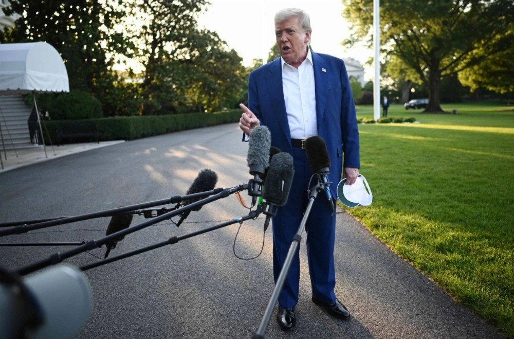 U.S. President Donald Trump speaks to the press before boarding Marine One from the South Lawn of the White House in Washington on Tuesday. U.S. President Donald Trump speaks to the press before boarding Marine One from the South Lawn of the White House in Washington on Tuesday.