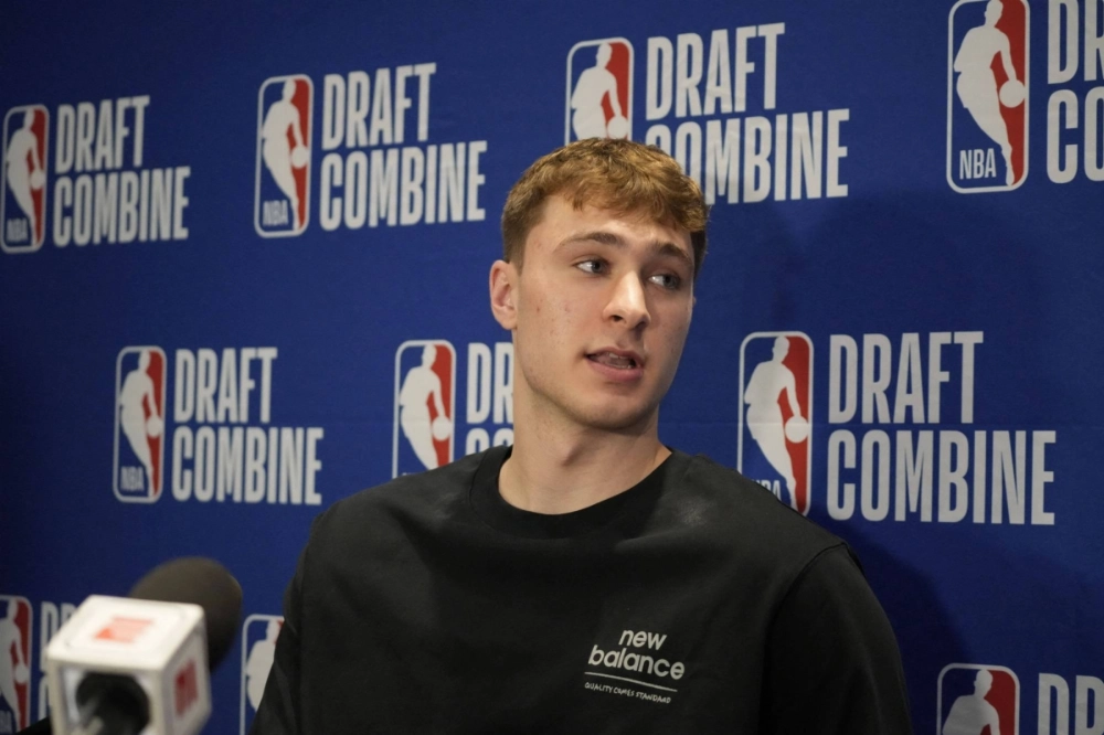 Cooper Flagg speaks to reporters during the NBA draft combine in Chicago on May 14.  Cooper Flagg speaks to reporters during the NBA draft combine in Chicago on May 14.