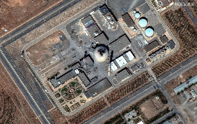 This satellite image taken on June 19 shows damage at the Iranian nuclear facility at Arak in central Iran after an Israeli strike.  This satellite image taken on June 19 shows damage at the Iranian nuclear facility at Arak in central Iran after an Israeli strike.