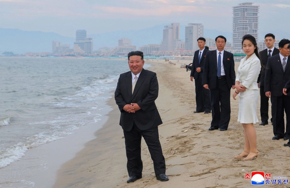 North Korean leader Kim Jong Un (left) and his daughter Kim Ju Ae (front right) visiting the Wonsan Kalma coastal tourist area in Kangwon Province, North Korea, on June 24. North Korean leader Kim Jong Un (left) and his daughter Kim Ju Ae (front right) visiting the Wonsan Kalma coastal tourist area in Kangwon Province, North Korea, on June 24.