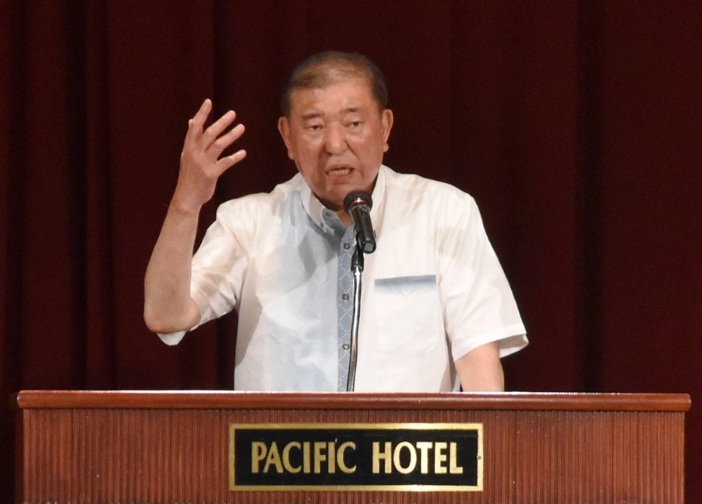 Prime Minister Shigeru Ishiba gives a speech in Naha on Friday.  Prime Minister Shigeru Ishiba gives a speech in Naha on Friday.