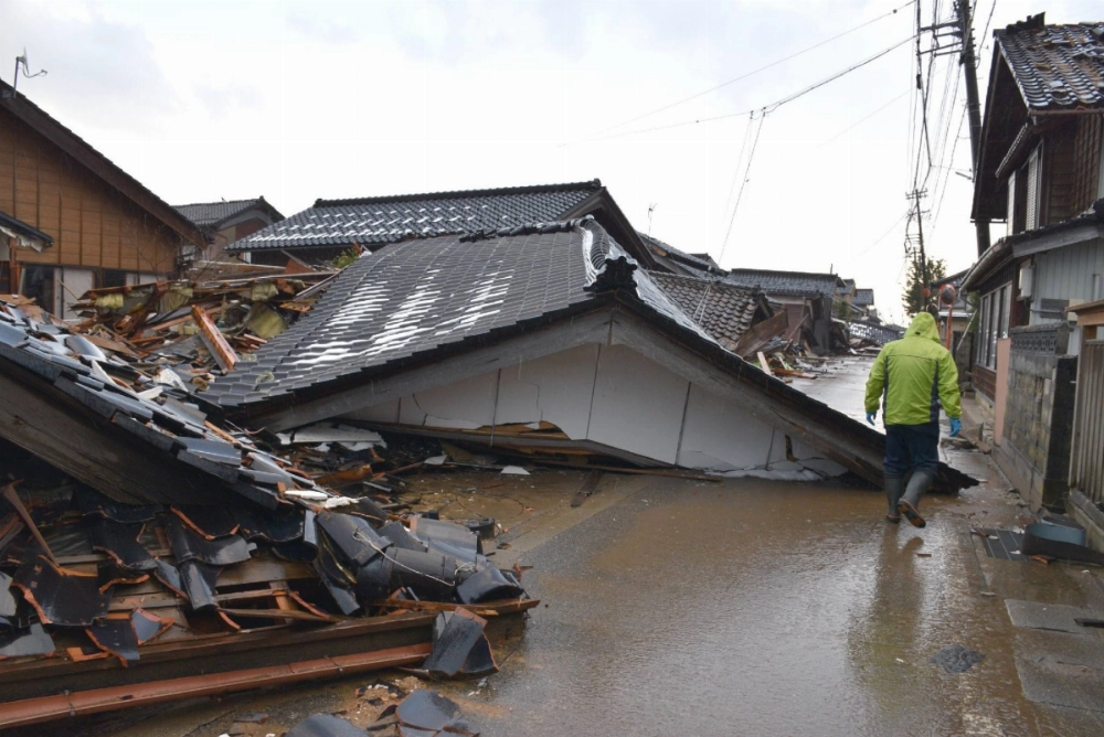 A house in Suzu City, Ishikawa Prefecture, after it collapsed due to the Noto earthquake, in January 2024. A house in Suzu City, Ishikawa Prefecture, after it collapsed due to the Noto earthquake, in January 2024.