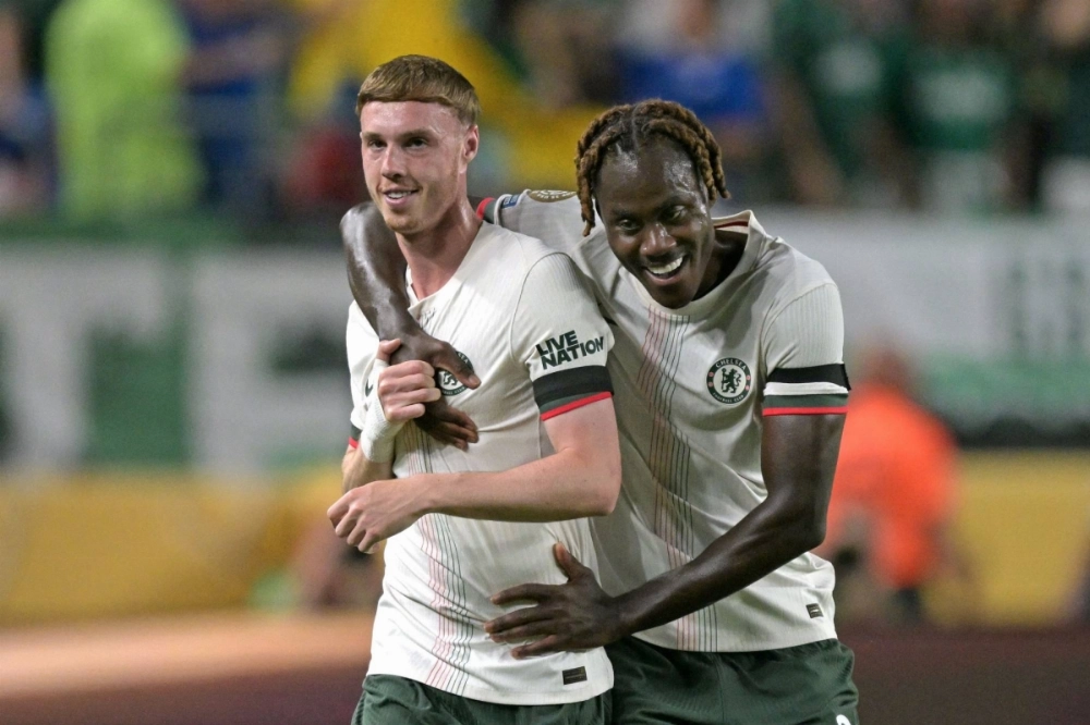 Chelsea midfielder Cole Palmer (left) celebrates with defender Trevoh Chalobah after scoring his side's first goal of the Club World Cup quarterfinals on Friday.  Chelsea midfielder Cole Palmer (left) celebrates with defender Trevoh Chalobah after scoring his side's first goal of the Club World Cup quarterfinals on Friday.