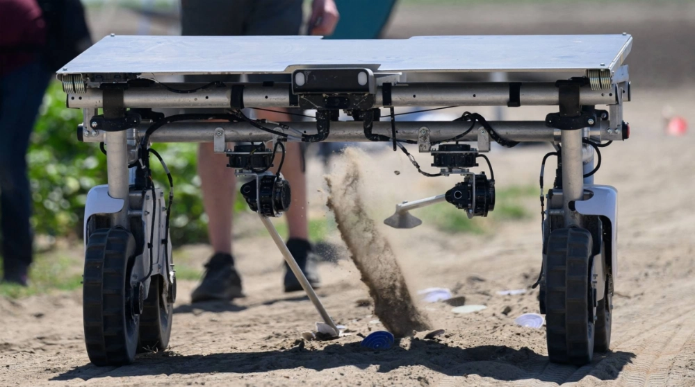 One of Aigen's solar-powered autonomous AI Element robots demonstrates how it can hammer down on specified targets at Bowles Farm in Los Banos, California, on June 26. One of Aigen's solar-powered autonomous AI Element robots demonstrates how it can hammer down on specified targets at Bowles Farm in Los Banos, California, on June 26.