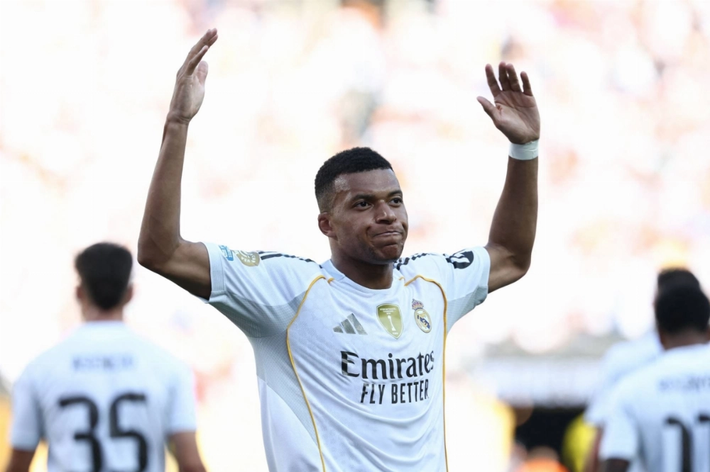Real Madrid forward Kylian Mbappe celebrates scoring his team's third goal during a FIFA Club World Cup 2025 quarterfinal match against Borussia Dortmund in East Rutherford, New Jersey, on Saturday. Real Madrid forward Kylian Mbappe celebrates scoring his team's third goal during a FIFA Club World Cup 2025 quarterfinal match against Borussia Dortmund in East Rutherford, New Jersey, on Saturday.
