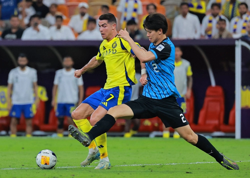 Kawasaki Frontale's Kota Takai (right) in action with Al-Nassr's Cristiano Ronaldo in an Asian Champions League semifinal match in Jeddah, Saudi Arabia, on April 30 Kawasaki Frontale's Kota Takai (right) in action with Al-Nassr's Cristiano Ronaldo in an Asian Champions League semifinal match in Jeddah, Saudi Arabia, on April 30