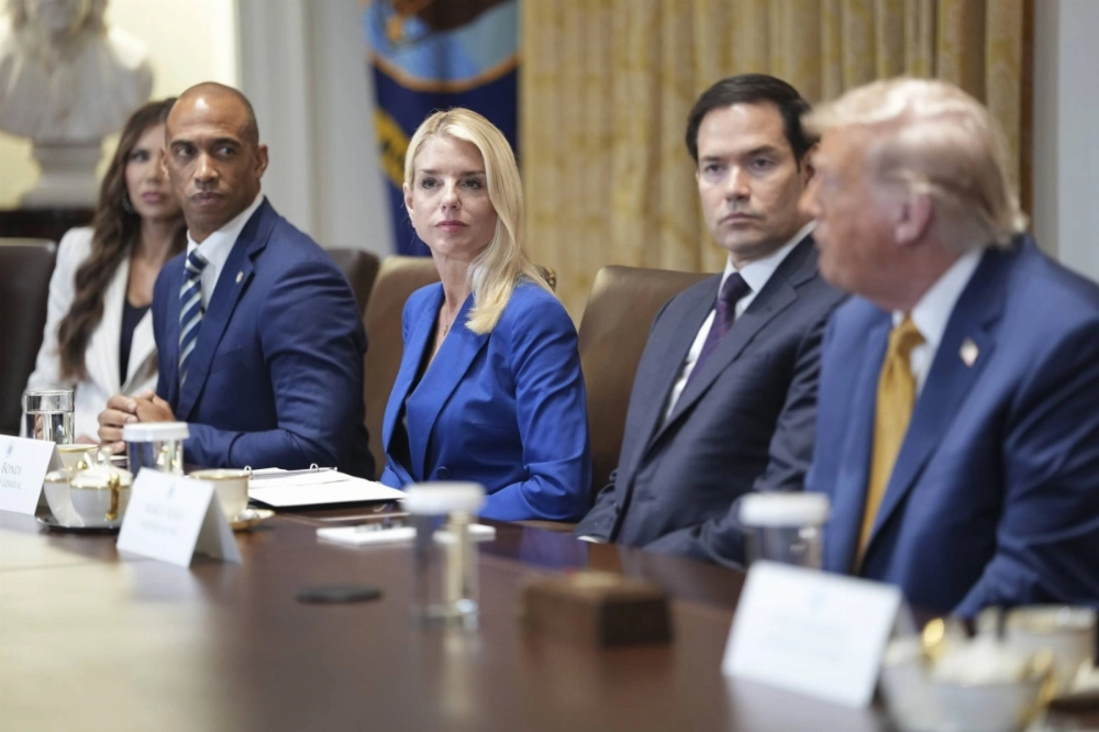 U.S. Attorney General Pam Bondi (center) during a Cabinet meeting at the White House in Washington on Tuesday. Bondi had assured Fox News she had a client list of financier and sex offender Jeffrey Epstein on her desk in remarks endorsed by the White House. U.S. Attorney General Pam Bondi (center) during a Cabinet meeting at the White House in Washington on Tuesday. Bondi had assured Fox News she had a client list of financier and sex offender Jeffrey Epstein on her desk in remarks endorsed by the White House.