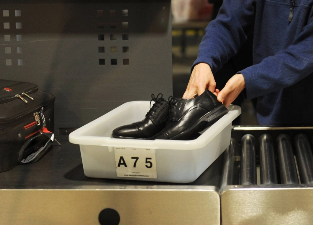 The Transportation Security Administration’s reversal on removing shoes ends a policy that has been for nearly two decades one of the most visible — and criticized — features of the post-9/11 heightened U.S. airport security system.  The Transportation Security Administration’s reversal on removing shoes ends a policy that has been for nearly two decades one of the most visible — and criticized — features of the post-9/11 heightened U.S. airport security system.