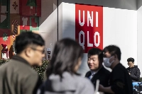A Uniqlo store in Shanghai. Fast Retailing, Uniqlo's owner, reported weak sales in China that weighted on its third-quarter earnings, which missed estimates. | Bloomberg