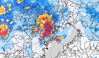 A screenshot of the Meteorological Agency website shows heavy rain in central Tokyo on Thursday evening.