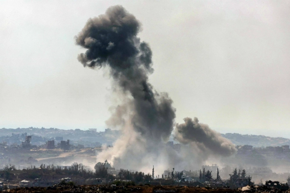 Smoke billows during an Israeli strike on Gaza on Thursday. U.S.-based Project HOPE said the strike had hit right outside its Altayara health clinic. Smoke billows during an Israeli strike on Gaza on Thursday. U.S.-based Project HOPE said the strike had hit right outside its Altayara health clinic.