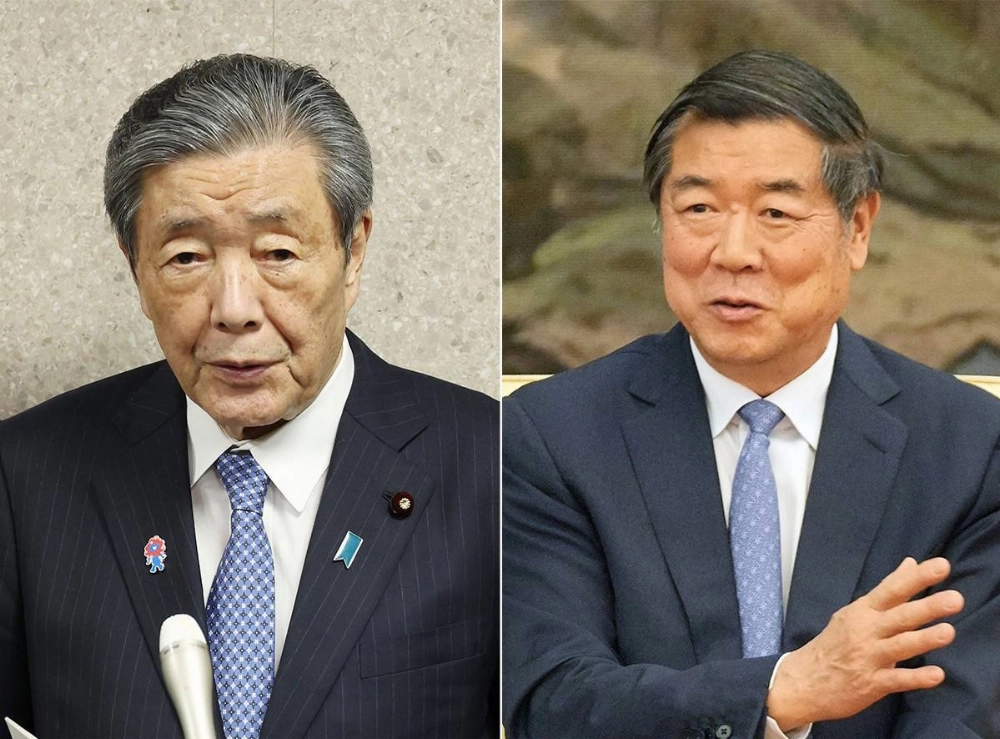 Hiroshi Moriyama (left), secretary-general of the Liberal Democratic Party and also head of a suprapartisan group of Japanese lawmakers promoting Japan-China friendship, and Chinese Vice Premier He Lifeng held talks in Osaka on Friday. Hiroshi Moriyama (left), secretary-general of the Liberal Democratic Party and also head of a suprapartisan group of Japanese lawmakers promoting Japan-China friendship, and Chinese Vice Premier He Lifeng held talks in Osaka on Friday.
