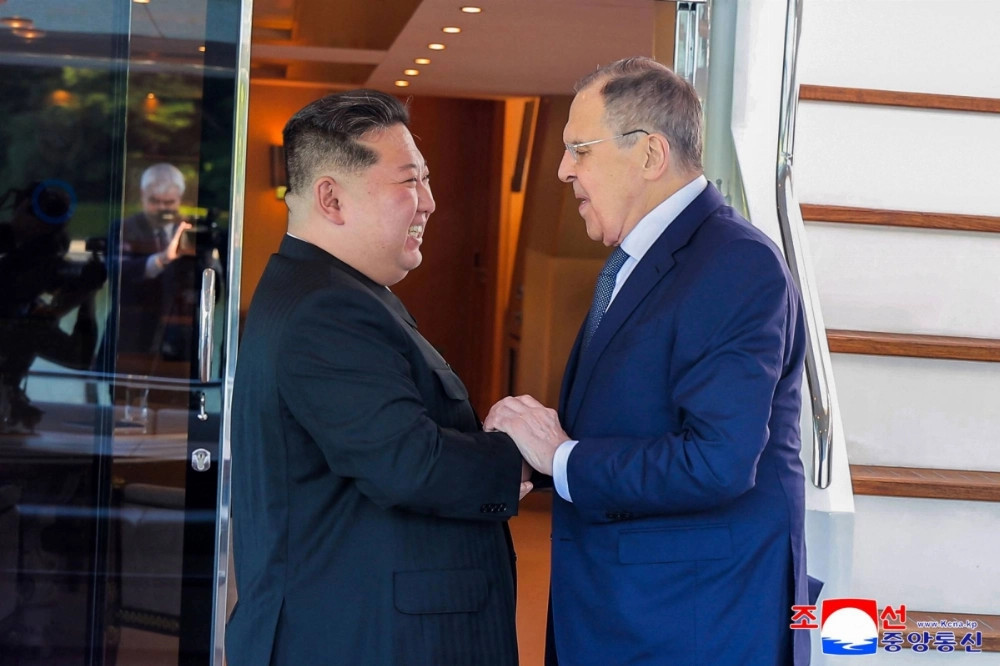 North Korean leader Kim Jong Un (L) greets Russian Foreign Minister Sergei Lavrov (R) in Wonsan, North Korea, on Saturday. North Korean leader Kim Jong Un (L) greets Russian Foreign Minister Sergei Lavrov (R) in Wonsan, North Korea, on Saturday.