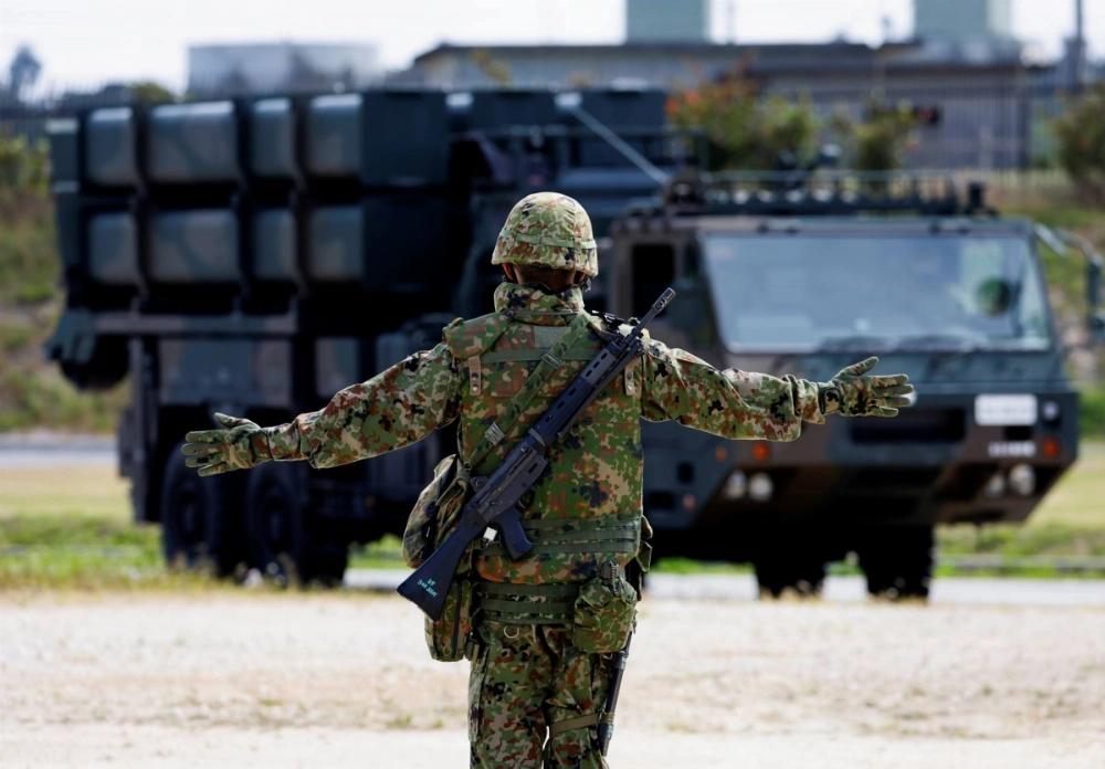 A Ground Self-Defense Force member conducts a military drill with an anti-ship missiles unit, at the GSDF's base on Miyako Island in Okinawa Prefecture in April 2022. A Ground Self-Defense Force member conducts a military drill with an anti-ship missiles unit, at the GSDF's base on Miyako Island in Okinawa Prefecture in April 2022.