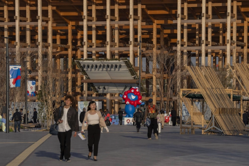 An intricate and massive wooden ring encircles the 2025 World Expo site in Osaka on April 9.  An intricate and massive wooden ring encircles the 2025 World Expo site in Osaka on April 9.