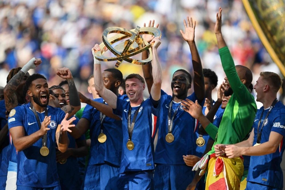 Chelsea midfielder Cole Palmer lifts the trophy with players during the award ceremony for the FIFA Club World Cup 2025 champion in East Rutherford, New Jersey, on Sunday. Chelsea midfielder Cole Palmer lifts the trophy with players during the award ceremony for the FIFA Club World Cup 2025 champion in East Rutherford, New Jersey, on Sunday.