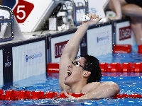 China's Wang Haoyu celebrates winning the men's 4x100m freestyle relay final at the World Aquatics Championships in Doha in February 2024. | REUTERS