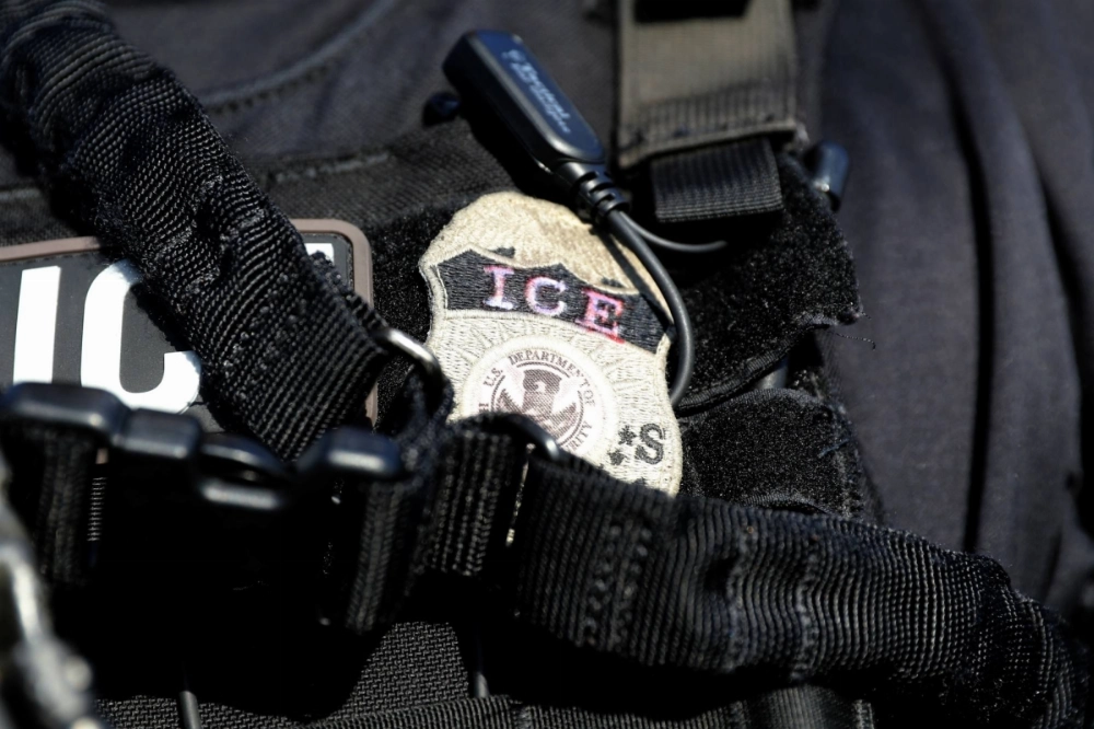 The badge of a U.S. Immigration and Customs Enforcement's (ICE) Fugitive Operations team is seen in Santa Ana, California, on May 11, 2017. The badge of a U.S. Immigration and Customs Enforcement's (ICE) Fugitive Operations team is seen in Santa Ana, California, on May 11, 2017.