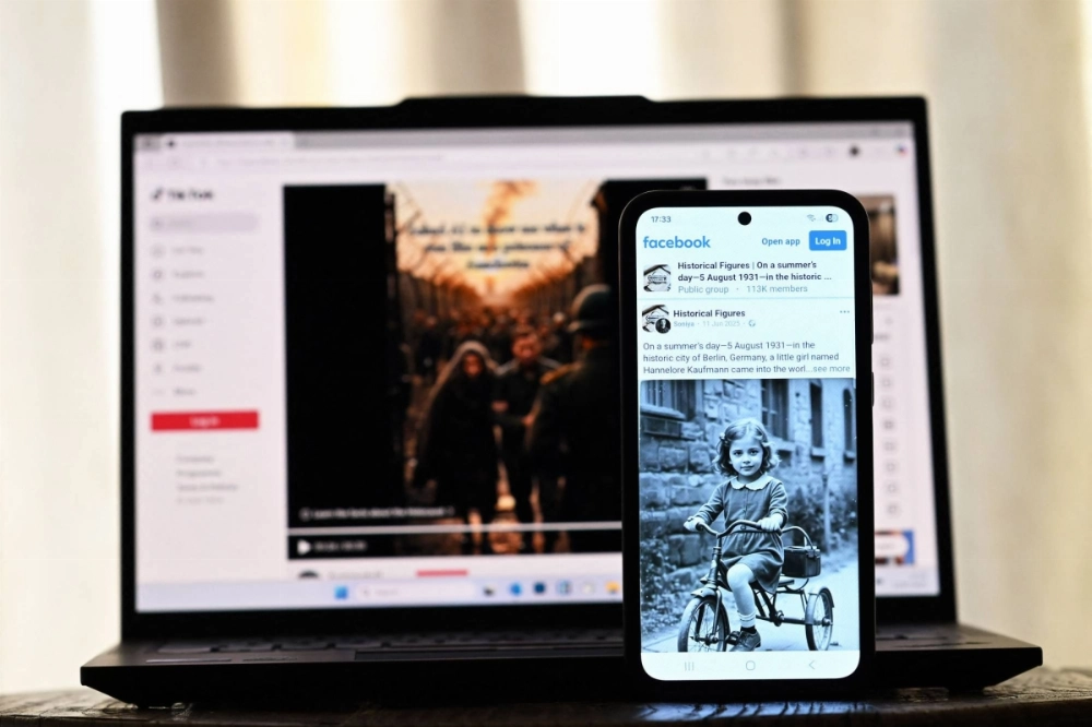 AI-created images of Holocaust-related subjects displayed on a laptop and a smartphone screens AI-created images of Holocaust-related subjects displayed on a laptop and a smartphone screens