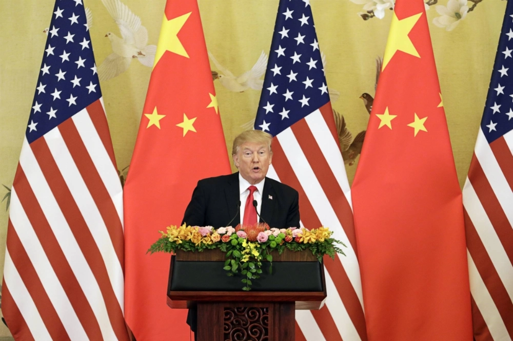 U.S. President Donald Trump in the Great Hall of the People in Beijing in 2017. Six months into his second term, Trump has softened his harsh campaign rhetoric that focused on the U.S.’ massive trade deficit with China and resulting job losses.  U.S. President Donald Trump in the Great Hall of the People in Beijing in 2017. Six months into his second term, Trump has softened his harsh campaign rhetoric that focused on the U.S.’ massive trade deficit with China and resulting job losses.