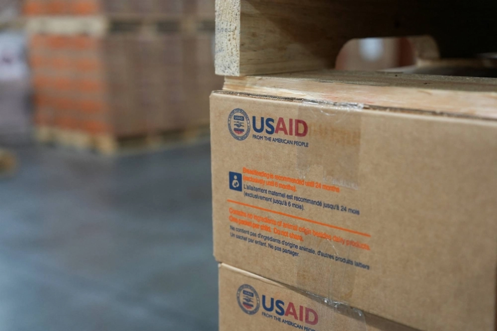 A packaged box of ready-to-use therapeutic food (RUTF) bears the USAID logo, inside MANA Nutrition’s plant in Fitzgerald, Georgia, on May 21. A packaged box of ready-to-use therapeutic food (RUTF) bears the USAID logo, inside MANA Nutrition’s plant in Fitzgerald, Georgia, on May 21.