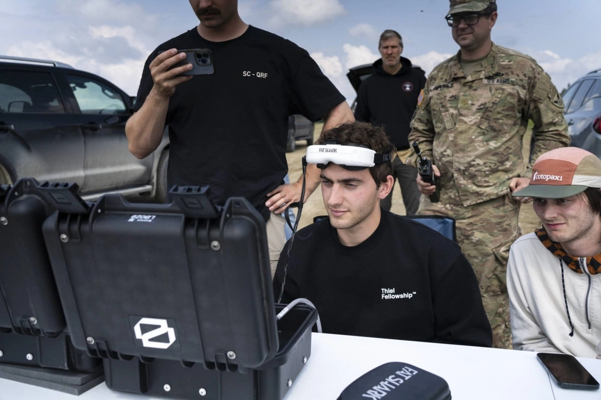 Soren Monroe-Anderson (center), chief executive and co-founder of Neros, a startup based in El Segundo, California, joins a military exercise demonstrating how far the U.S. military and American drone companies lag behind China in the technology, at the Yukon Training Area in Alaska on June 25. Soren Monroe-Anderson (center), chief executive and co-founder of Neros, a startup based in El Segundo, California, joins a military exercise demonstrating how far the U.S. military and American drone companies lag behind China in the technology, at the Yukon Training Area in Alaska on June 25.
