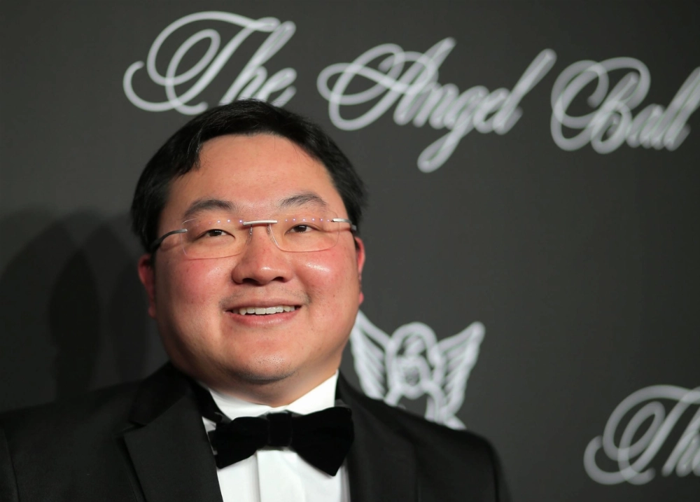 Malaysian businessman and fugitive Low Taek Jho, better known as Jho Low, in 2014. Low is wanted in connection with the multibillion-dollar collapse of 1MDB, a Malaysian wealth fund. Malaysian businessman and fugitive Low Taek Jho, better known as Jho Low, in 2014. Low is wanted in connection with the multibillion-dollar collapse of 1MDB, a Malaysian wealth fund.