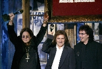 From left: Ozzy Osbourne, Geezer Butler and Tony Iommi of Black Sabbath after being inducted during the Rock and Roll Hall of Fame Induction Ceremony in New York in 2006 | AFP-JIJI