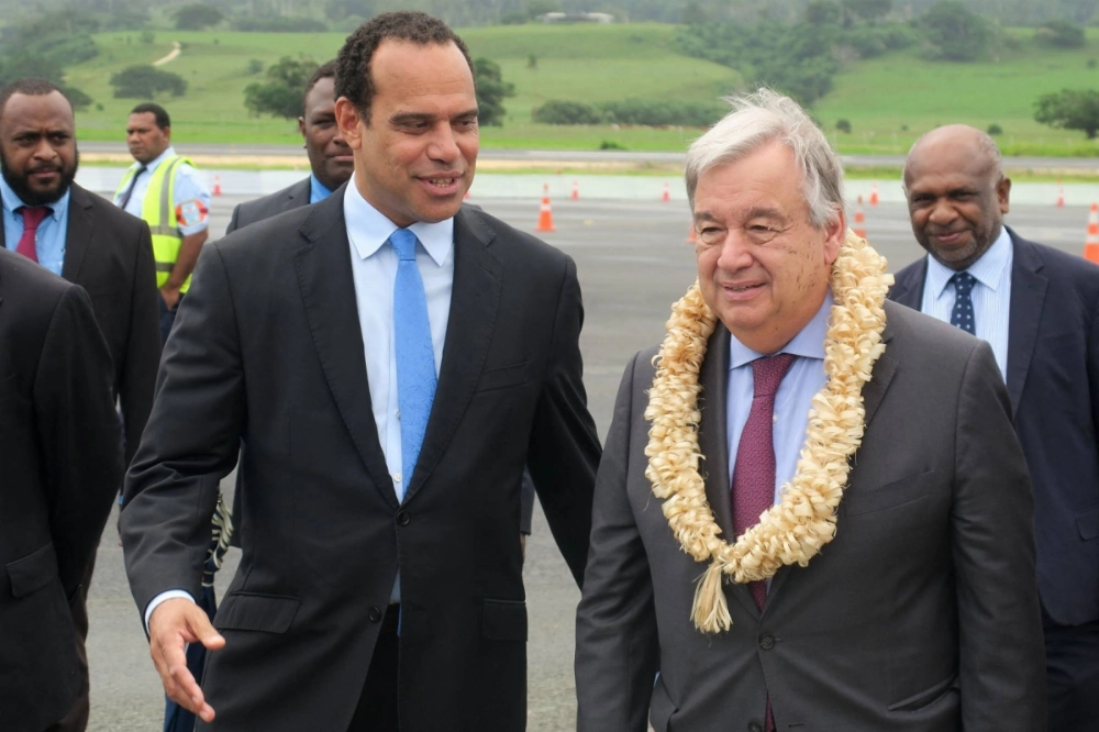 Vanuatu's Foreign Minister Ralph Regenvanu (left) welcomes United Nations Secretary General Antonio Guterres on the tarmac of Port Vila's international airport, on May 18, 2019. Vanuatu's Foreign Minister Ralph Regenvanu (left) welcomes United Nations Secretary General Antonio Guterres on the tarmac of Port Vila's international airport, on May 18, 2019.