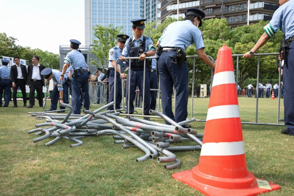 Police officers prepare the venue where Prime Minister Shigeru Ishiba, leader of the ruling Liberal Democratic Party, was scheduled to deliver his first campaign speech for the Upper House election, on July 3 in Kobe. Police officers prepare the venue where Prime Minister Shigeru Ishiba, leader of the ruling Liberal Democratic Party, was scheduled to deliver his first campaign speech for the Upper House election, on July 3 in Kobe.
