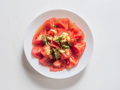 Juicy and refreshing, marinated tomatoes make the perfect side dish to cool you down this summer. Juicy and refreshing, marinated tomatoes make the perfect side dish to cool you down this summer.