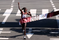 Peres Jepchirchir of Kenya celebrates after winning women's marathon gold at the Tokyo 2020 Olympic games at Sapporo Odori Park in Hokkaido, Japan on Aug. 7, 2021. | Reuters