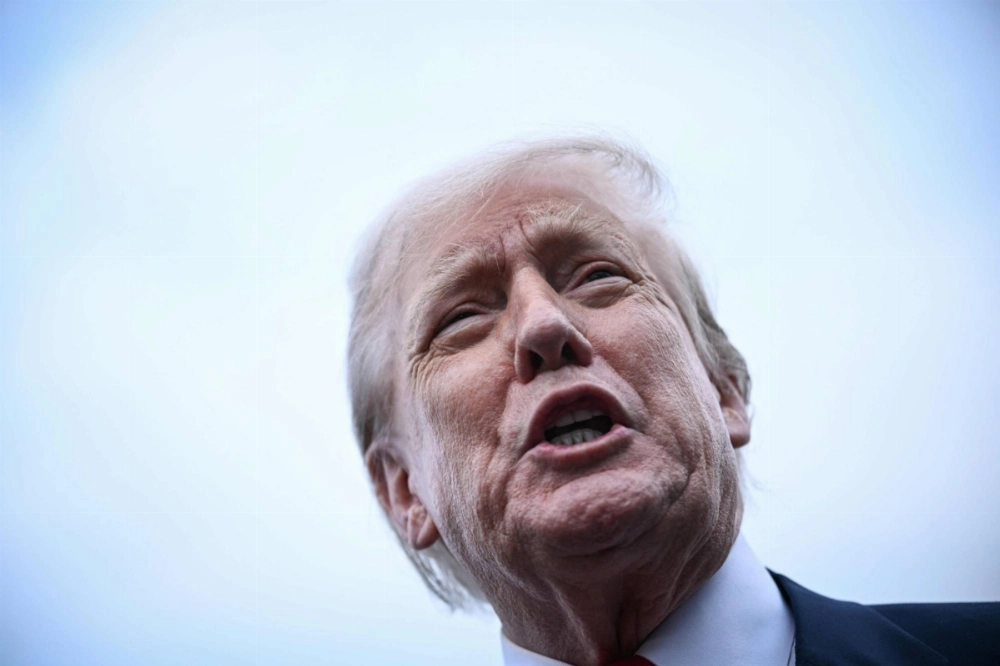 U.S. President Donald Trump speaks to reporters after arriving at Prestwick Airport, near Glasgow, Scotland, on Friday.  U.S. President Donald Trump speaks to reporters after arriving at Prestwick Airport, near Glasgow, Scotland, on Friday.